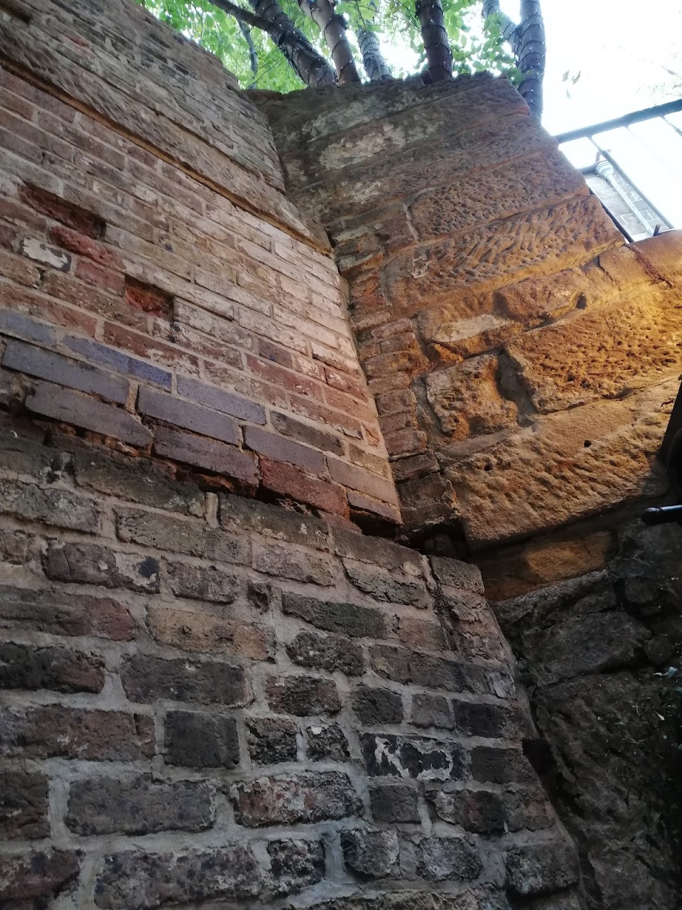 Historic sandstone and brick detail at The Doss House
